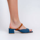 Blue denim block heel mules for women styled with jeans